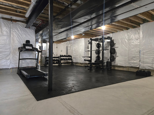 Finished basement home gym in Northville, MI by Forged Fitness
